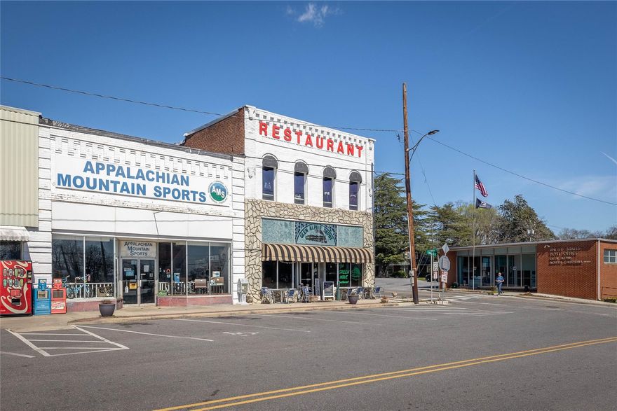 Here is your opportunity to own the "Glen Alpine Depot". This nostalgic building in the heart of Glen Alpine has been well maintained. It currently host the Green Wave Restaurant which is in the process of moving out. All restaurant equipment will be included in the sale of this property. The kitchen and main dining area are located on the main level. Upstairs is a bar with its own bathroom, this area could be changed to another use. There is an interior set of steps and an exterior set of steps to get to the upstairs portion, it could be rented separately. This sale will also include the parking lot and vacant lot located behind the building.