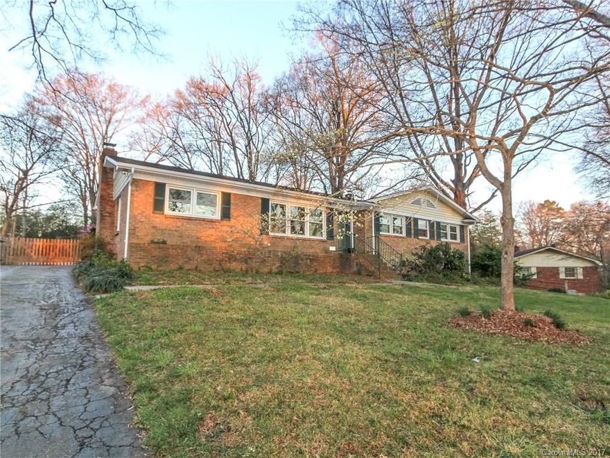 Wow!  Check out this large all brick ranch. New roof 2013, HVAC 2015, water heater 2012.  Updated kitchen cabinets and appliances, updated modern updated baths with beautiful tile, new lighting, new sinks and vanities.  Freshly painted and new carpet makes this one truly move-in ready. Delightful huge fenced yard. 1 Year Home Buyer Warranty included.

 Fireplace sold "as-is" no known problems.  Outdoor shed sold "as-is" no known problems.