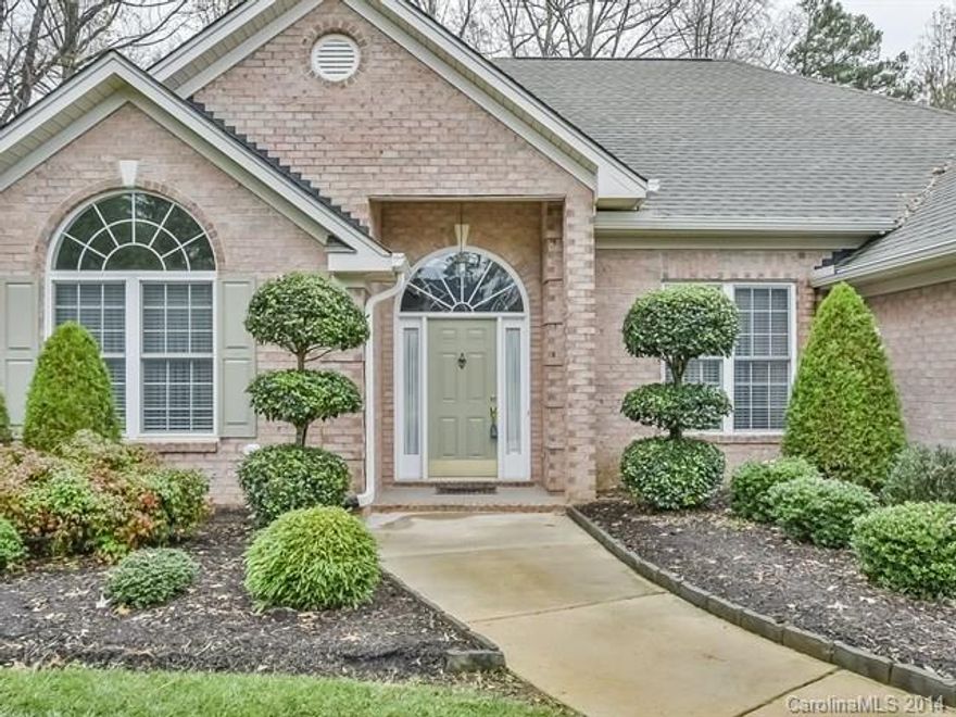 Stunning Ranch home in superb condition combines advantages of one-level living with the style & space of multi-level designs. Home features 4 large bedrooms, hardwoods, screened porch, patio. Amazing kitchen with sunny breakfast area & oversize cabinet space. Huge Master suite boasts vaulted ceiling, space, separate tub/shower. Close to schools, shops, YMCA, restaurants & more. Home is complemented by amazing landscape--on 1/2 acre. For buyers who want the best of everything, this home is it.