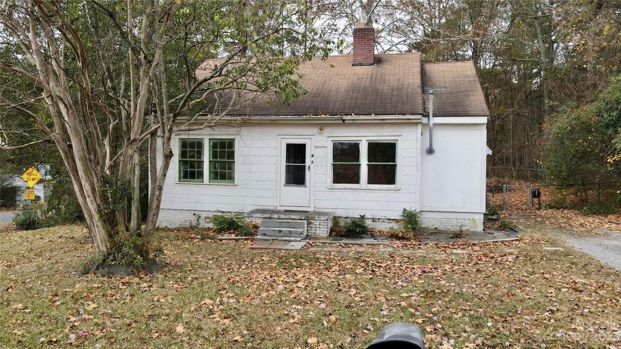 Cape Cod-style home with charm and cozy appeal. This home is perfect for an investor or a first time homeowner willing to put in some "sweat equity" and make all your DIY projects a reality! Move in and repair at your own pace! Affordability is key with this home, at a great price point.  This home features three bedrooms and an additional bonus room which can offer excellent versatility and potential for customization.  A level lot with a deck and wooded surroundings is a fantastic setting for hosting summer cookouts and enjoying outdoor activities. This home is located within the city limits and close to shopping and restaurants offers a vibrant and convenient lifestyle. Brand new HVAC unit has been installed. Check out virtual tour of property!