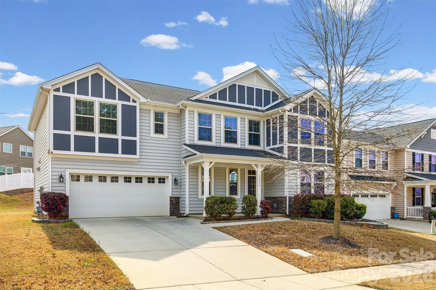 This stunning, freshly painted 4-bedroom, 2.5-bathroom residence offers modern comfort and versatile living spaces in a highly sought-after location with easy access to Lake Wylie and the Palisades. This home boasts an open-concept design, and features a kitchen with large island, designer lighting, gas range,  and more thoughtful upgrades throughout.
Step inside to discover a spacious flex space downstairs, ideal for a formal dining room, home office, or even an additional bedroom to suit your needs.
The luxurious primary suite is a true retreat, featuring dual sinks, a separate shower, and a relaxing bathtub for unwinding after a long day.
Don’t miss the opportunity to own this move-in-ready gem!