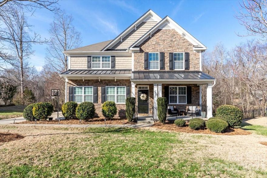 Beautiful 5 bedroom, 4 bathroom home located in one of Rock Hill's few gated communities of Chapel Gate. As you step inside you are welcomed into a sunny foyer with access to a large dining room. Open kitchen invites you to a roomy breakfast area and great room with gas fireplace. Main floor offers a bedroom and full bath that can be used as an office. On the second floor is the primary master suite with luxury bath, 3 additional bedrooms, one jack-n-jill bathroom and one other full bathroom...for a total of 4 bathrooms in this lovely home. Large laundry room on second floor. Entertain on the spacious Trex deck overlooking HOA common area and woods. Enjoy the terraced yard complete with gorgeous boulders and fire pit. Minutes away from Lake Wylie and Ebenezer Park.