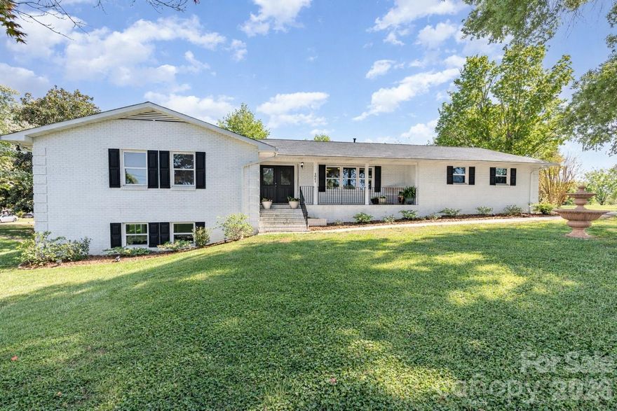 This FULL Basement ALL BRICK RANCH HOME is built to last, offering unmatched durability, energy efficiency, and the convenience of true main-level living. Thoughtfully designed, it includes laundry hookups on both levels, making it a perfect fit for multi-generational living or flexible lifestyle needs.

Completely remodeled and move-in ready, the home sits on a spacious .71-acre lot with no HOA and is just minutes from the new Lake Norman Golf Club. Inside, you’ll find luxury vinyl plank flooring throughout, fresh neutral paint, a newer HVAC and roof (approx. 3 years old), and all-new energy-efficient windows.

The main level features a large living room, a dedicated dining room, a cozy family room with a natural gas fireplace, plus three bedrooms and two and a half baths. The kitchen has been fully updated with new cabinetry and granite countertops, creating a modern, functional hub for the home.

The expansive, fully finished lower level offers incredible versatility and value. With its own full bath, sliding glass door, and natural gas fireplace, this space can serve as a bonus family room, home office, guest quarters, or even an in-law suite—complete with its own laundry hookup for added independence.

Located within 3 miles of a hospital, pharmacies, medical offices, major retailers, grocery stores, upscale restaurants, award-winning schools, and I-77, this home combines solid craftsmanship, modern efficiency, and everyday convenience.