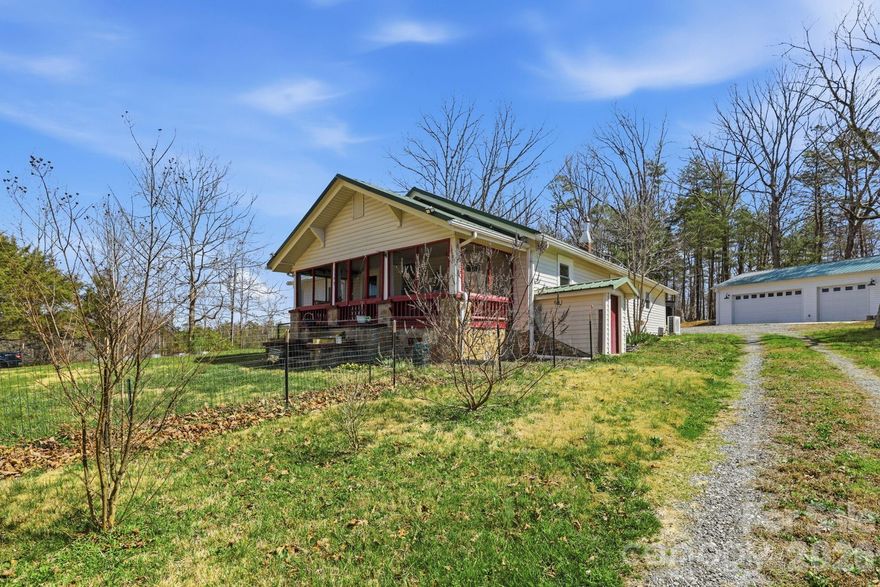 Own 5+ acres with endless possibilities. This private residence is situated in a quiet countryside location and offers potential for other opportunities via an additional private living quarters located on a separate parcel. This additional living space offers its own electrical, septic system, bedroom, and kitchen. The combined parcels encompass five plus acres, providing expansive mountain views and enhanced privacy. The main home features two bedrooms plus a versatile bonus room or office, with a beautiful primary suite and bathroom. An oversized garage accommodates a variety of hobbyist activities or storage needs and leads to additional living space. Plenty of room to roam, plant a garden, and much more!