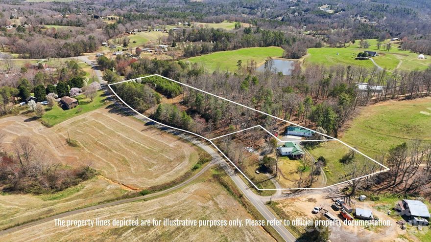 Own 5+ acres with endless possibilities. This private residence is situated in a quiet countryside location and offers potential for other opportunities via an additional private living quarters located on a separate parcel. This additional living space offers its own electrical, septic system, bedroom, and kitchen. The combined parcels encompass five plus acres, providing expansive mountain views and enhanced privacy. The main home features two bedrooms plus a versatile bonus room or office, with a beautiful primary suite and bathroom. An oversized garage accommodates a variety of hobbyist activities or storage needs and leads to additional living space. Plenty of room to roam, plant a garden, and much more!