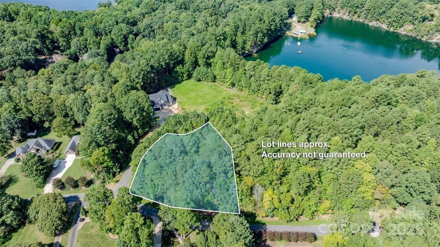 Enjoy easy access to shopping, dining, and other conveniences while being just one mile from Lake Norman’s boat ramp. With utilities already set up, building your new home here is straightforward. The property backs up to the PDRA Quarry and Lake Norman, offering added privacy. Recent nearby construction shows how this area is growing, making this land a nice choice for anyone looking to be part of a thriving lakeside community.