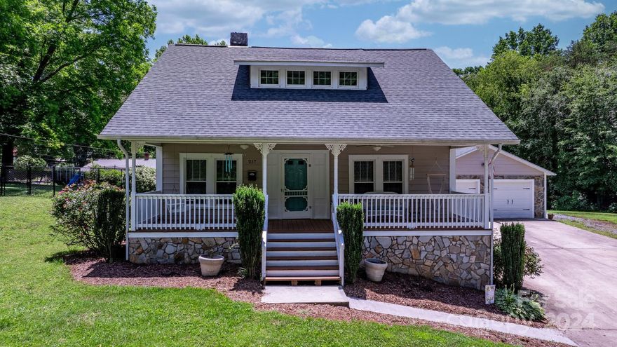 Remarkable 3 BR 2BA home within walking distance to downtown Morganton. Upon entering the home from the rocking chair front porch, you will find a lovely living room with a beautiful stone fireplace. Continuing through the home you will notice the main level boasts a spacious eat in kitchen with a farmhouse sink, dining room, master bedroom with oversized walk-in closet and a large bathroom with a soaking tub and shower. Upstairs you will notice an open loft area, 2 bedrooms and a bathroom. Step out back and enjoy the outdoor oasis complete with a stone fireplace perfect for entertaining or relaxing. A detached 2 car garage and storage shed complete the property. Home has termite bond through Dodson. Schedule your showing today to come see the charm and character of this almost 100-year-old home!