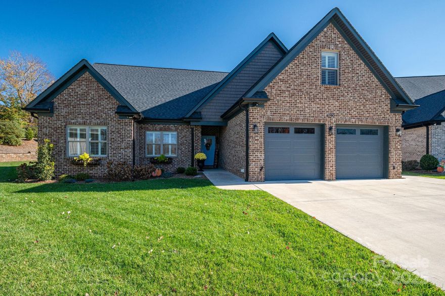 Just Like New & Move-In Ready! This fabulous home offers an open floor plan with a split-bedroom layout and high-end finishes throughout. The spacious kitchen features quartz countertops, custom cabinets with pull-outs and a lazy Susan, decorative backsplash, large island, gas range, and a walk-in pantry with butcher block appliance counter. 
The living room includes a wet bar and gas fireplace, opening to a covered patio overlooking a private backyard with custom landscaping and exterior uplighting.
The primary suite features a large walk-in closet, tile shower, soaker tub, double vanity, and decorative tile flooring. Additional features include custom plantation shutters, a laundry room with barn door, and a double garage with a separate golf cart door.
Upstairs offers a large bonus room, guest bedroom with walk-in closet, full bath, and walk-out attic storage. Home also includes a tankless gas water heater, beautiful curb appeal and more!
Enjoy Resort like living at Beautiful Rock Barn Golf and Spa. Rock Barn Country Club offers a restaurant, world-class spa, and public golf course, with additional amenities available via club membership.