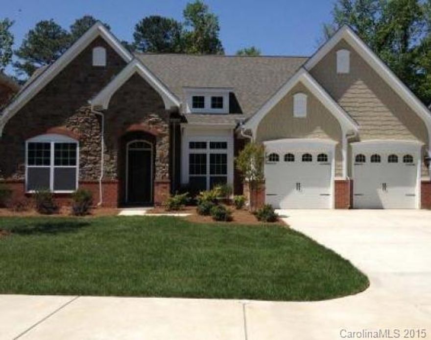 Beautiful Hardwoods throughout main floor. Kitchen boasts granite countertops, stainless steel appliances to include refrigerator, 42" white cabinets, gas range, large granite island. Extended great room with gas fireplace. Bonus room upstairs. Separate soaker tub with stand up shower and tile surround. Gorgeous stone exterior, with side load garage and 2' bump out. Brick paver patio that backs up to common area.