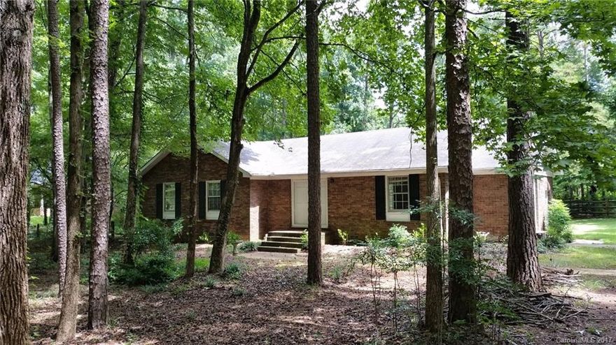 Great property in the Mint Hill area.  Large level lot for spreading out.  Large outbuilding for your storage needs.  Easy access to I-485.  Range, Refrigerator, Dishwasher, Washer/Dryer connections.  New Carpet and flooring throughout.  Fresh coat of paint.
