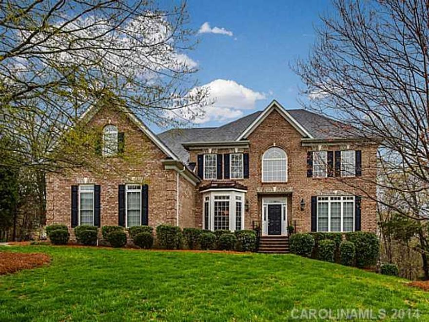Stunning 7 BR, 5BT. 2 Half BT w/curb appeal & private 1A homesite. Upgrades thru-out home. Floor plan flows beautifully. Guest BR main level & private BR/BT in basement. New counters/tiles, new appls, lighting, etc. Ready for quick closing date. 2 fpl w/gas logs. Master BR w/lg closet & exercise/hobby room attached. HW floors main level except BR/BT/UT. UT rm on 2nd level w/hookups on main & bsmt.