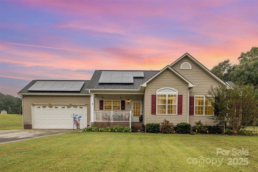 Welcome home to this beautifully maintained residence in West Lincolnton featuring three bedrooms and two baths. The open living area is enhanced by hardwood floors, while the kitchen offers tile flooring, stainless steel appliances, and oak cabinetry. The spacious primary suite includes dual vanities, a whirlpool tub, and a spacious closet. Additional highlights include a two-car attached garage with built-in shelving, a screened rear porch, and a partially above-ground pool with a custom deck. Recent updates bring peace of mind with a new sump pump and dehumidifier, a newly installed fuel tank, solar panels with a backup generator, and meticulous landscaping complete with an herb garden. This property seamlessly blends comfort, style, and outdoor living, ready for its next owner to enjoy.