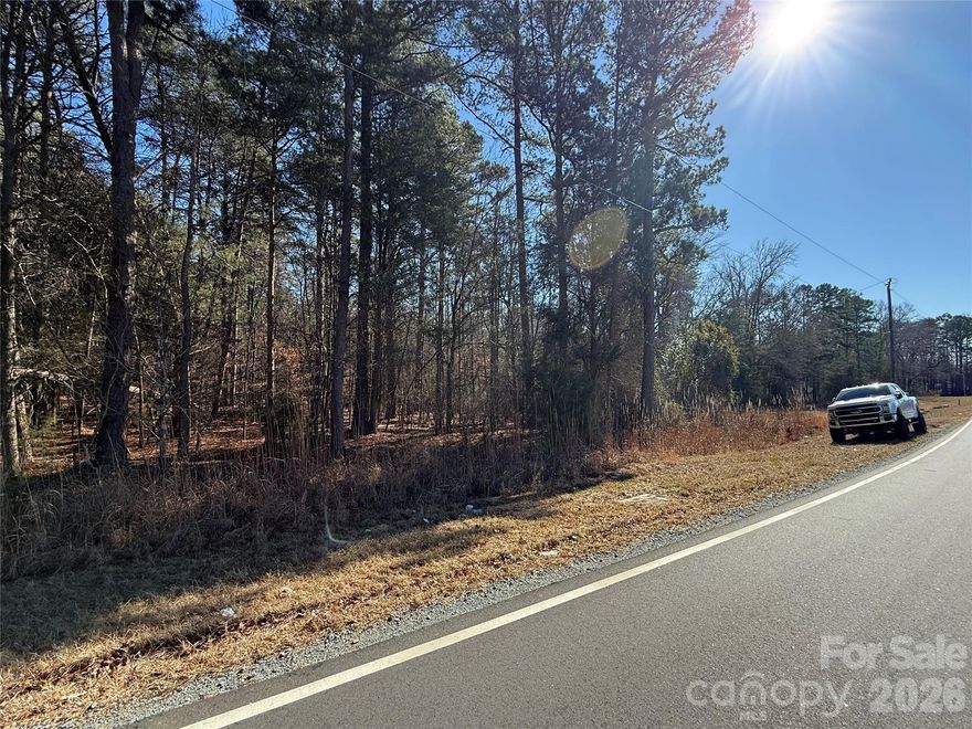 Discover an exceptional opportunity to build your dream home in highly desirable Southwest Charlotte! Enjoy the freedom of no HOA restrictions and the convenience of a location that is not tucked away in a traditional neighborhood. The spacious, wooded lot provides a sense of seclusion and natural beauty, offering both privacy and tranquility. With easy access to major highways, shopping, and dining. This property perfectly balances peaceful living with urban convenience. Don’t miss your chance to create the ideal home in a prime Charlotte location!