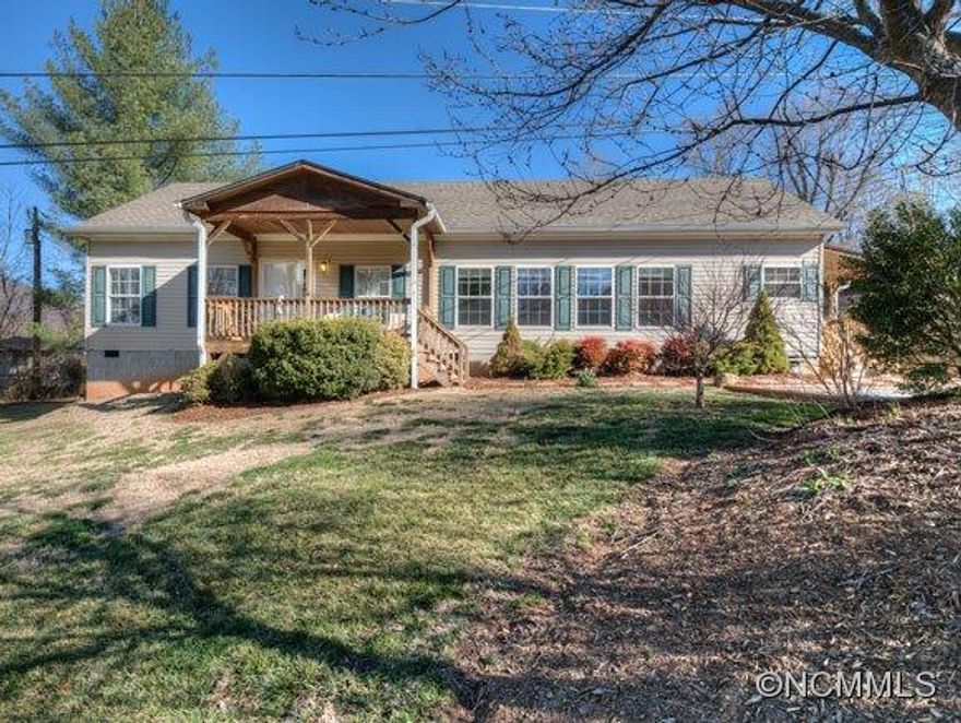 Spacious 2 Bedrooom home with bonus room located on private lot easily accessible to Asheville, Tunnel Road, VA and I-40.  Kitchen boasts large island, large pantry & eat in kitchen.  Split bedroom plan with large master bath and walk in closet. Gas log fireplace in living room and open dining and living room floor plan. USDA qualified home.  Home has a 2 car carport and storage shed.