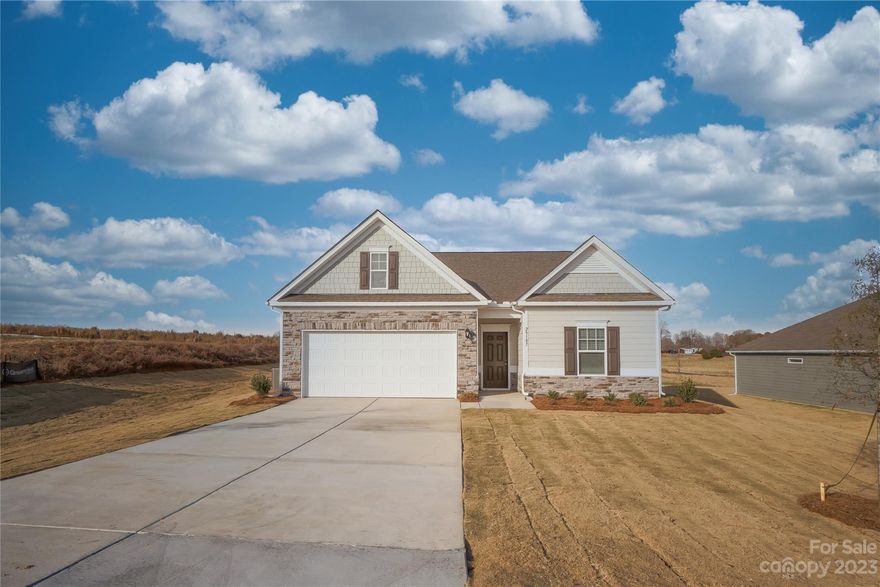 New Year, New You, New HOME!! Limited time offer of up to 5,500 towards closing costs when you use our preferred lender and attorney! Discover tranquil living in The Bradley, an exquisite find in Copper Ridge! Don't let this opportunity pass you by to own a stunning ranch home nestled on a spacious .6-acre lot.

Thoughtfully designed, the secondary bedrooms are discreetly separated by a full bath, offering both privacy and convenience. Down the foyer, an open kitchen, family room, and dining area create a harmonious living space. The home includes a private owner's suite for a serene retreat. The kitchen boasts white cabinets, SS appliances, quartz countertops, and a white tile backsplash. The oversized island takes center stage for entertaining, offering a clear view of the family room, dining area, and the inviting covered rear patio. This home offers suburban comfort with quick access to outdoor activities, wineries and shopping. Millingport and North Stanly school districts.