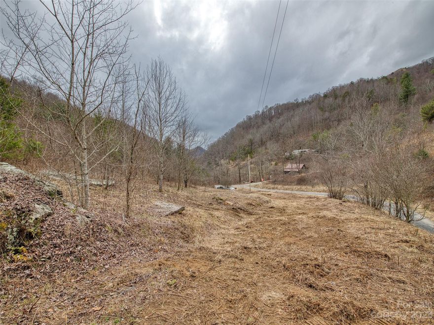 Unrestricted and Private 3.4 acres, with year around mountain views. Property located in beautiful Upper Crabtree area.  This is a great opportunity to have your private retreat. Location is great - only 14 min. to Interstate 40, 35 min. to West Ashville, 25 min. to Waynesville and 20 min to local amenities in Clyde, 40 min to Sylva, and 50min to Cullowhee the home of Western Carolina Unv. Build your mountain home, rental or Airbnb today, and you will be centrally located to all the amenities the Great Smokies offers: hiking, Great Smokies Parkway, zip lining, river rafting in the Nantahala River, Harrah's Casino in Cherokee, and much more!