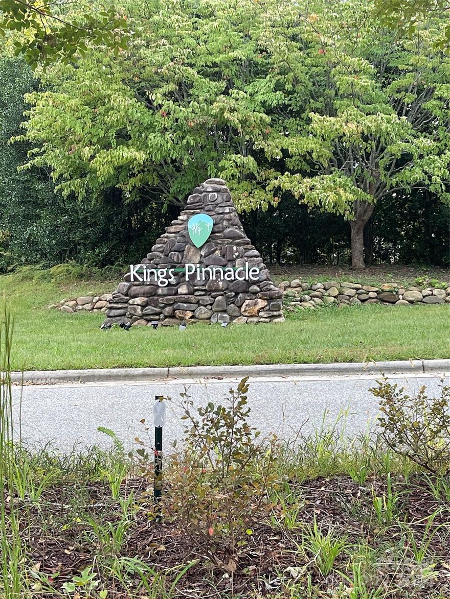 The 1.24 acre lot has natural beauty and is surrounded by lush trees and wildlife, providing a peaceful retreat from the hustle and bustle of everyday life. Enjoy the tranquility of nature right in your backyard.
Custom Home Potential. With all homes in Kings Pinnacle being custom-built, you have the freedom to design and create your dream home tailored to your unique taste and lifestyle.
Convenient Location, being just 6 miles from the new Catawba Two Kings Casino means you can easily indulge in entertainment, dining, and leisure activities, while still enjoying the seclusion of your wooded haven.