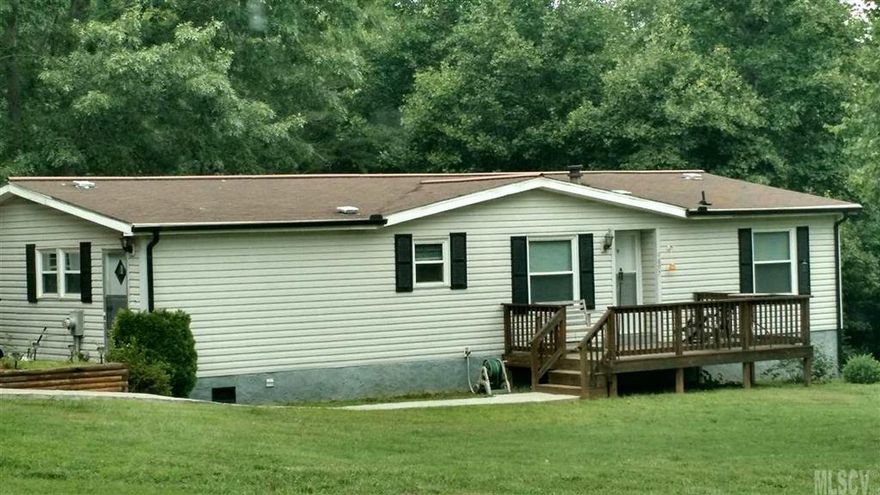 nice home and land level and great place for a garden and hunting. Has a detached carport and storage building