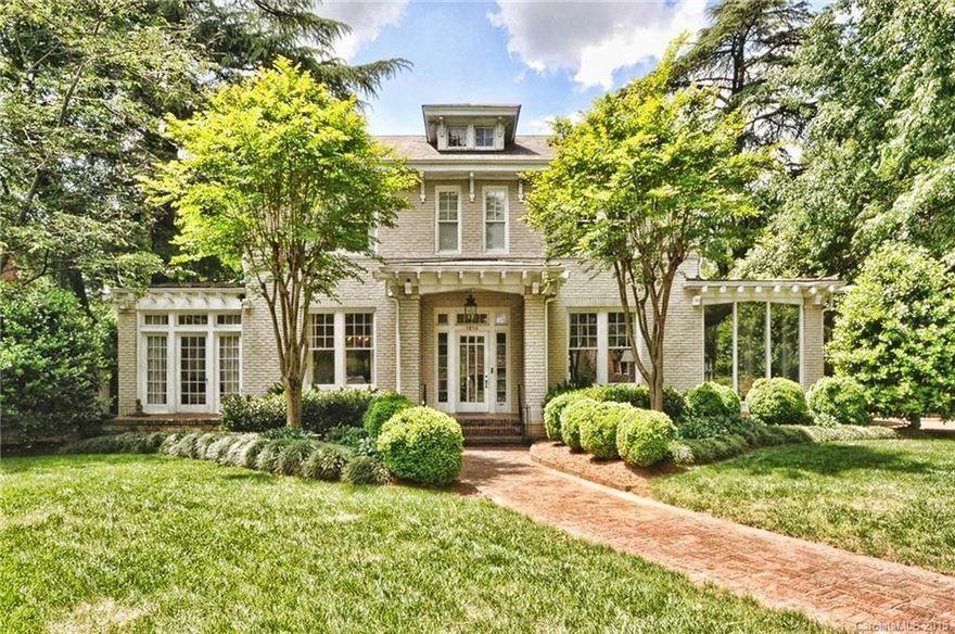 Classic Dilworth two story all brick home. High ceilings. Architectural detail. Huge center hall. Large formal living room and and dining room with beautiful sunrooms off both. Open floor plan with chef's kitchen and butlers pantry open to breakfast area and great room with fireplace. Master suite up with office and walk in closet. Three additional bedrooms and two baths up.  Third floor playroom. Entire home renovated in 1996. Two car garage.  Large fenced yard with mature landscaping.