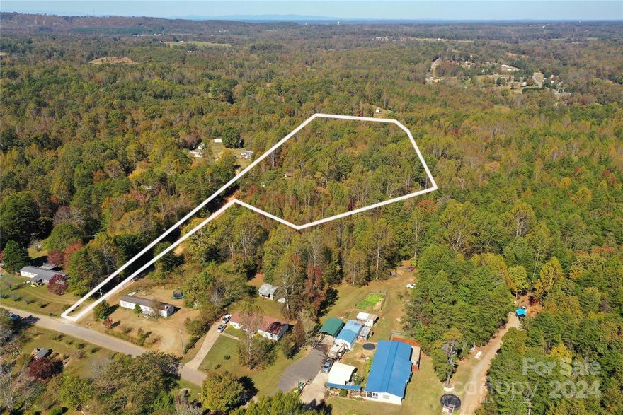 This remarkable 8.77-acre property in Blacksburg, SC, offers a rare opportunity with electricity, a well, and septic system already installed on-site. Free from HOA constraints and zoning restrictions, it’s a wonderful blank canvas to build your dream home or invest in a unique project. Enjoy the tranquility of rural living while still being just a short drive from the rich history and outdoor adventure of Kings Mountain National Military Park. With quick access to I-85, you’re conveniently situated for easy commutes to both Charlotte and Spartanburg. Surrounded by nature, with local fishing spots and hiking trails, this land offers the best of peaceful living and recreational opportunities. Priced below market value, this property is a valuable investment for homeowners and developer