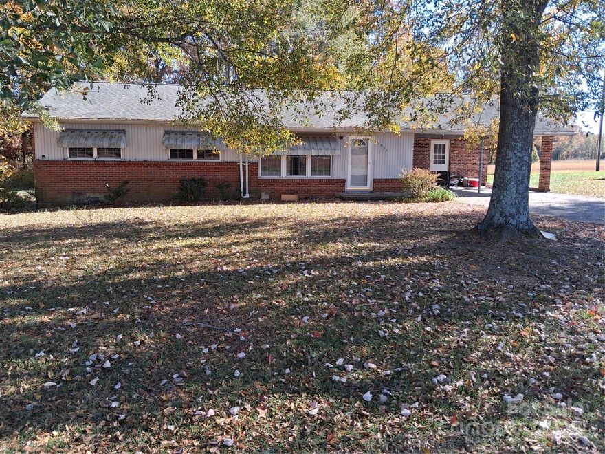 Welcome to 2833 Camp Creek Ch. Rd.  Cozy, country living, conveniently located to Boiling Springs NC and to Gaffney SC. This charming 3 bedroom, 1 1/2 bath ranch has 6.39 acres and a spacious workshop out back. It also has a large cement back porch, perfect for grilling, entertaining, or just hanging out on warm summer evenings. Needs some TLC and personal touches to make it your very own. No HOA's. Minutes from I-85 or Broad River Greenway. Don't miss out on this opportunity.