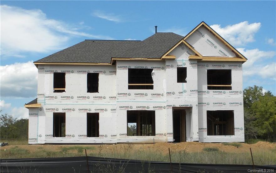 Brick-Front Providence II Home w/Flex Room Down, 2-Car Side Load Garage w/Opener, Study, 9’ Ceilings, Hardwoods in GR/DR/Study/Kit/Brk/Stairs, Iron Spindles on Main & Exec Trim Pkg. Extended Kitchen has Granite Counters, Stainless Appliances—Gas Range, Travertine Backsplash, 42” Cabinets, Butler's Pantry Plus Walk-In Pantry! Great Room w/36” Gas Fireplace. Tile Floors in Baths & Laundry. MBA w/Granite & Tub w/Tile Surround, 5.1 Surround Sound Prewire, Under Cabinet Lights, Gas Furnace, 225 Patio