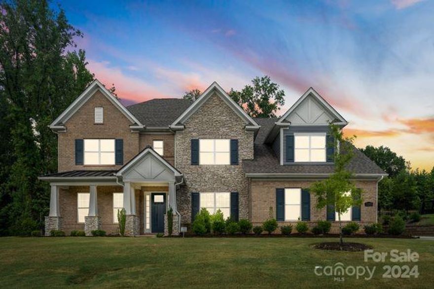 Discover luxury living in Bretagne's exclusive estates enclave. This private, gated community is ideally situated just minutes from the new Ballantyne Bowl and amphitheater, premier shopping, and fine dining. Built in 2021, this exquisite brick home boasts 5 bedrooms, 5.5 baths, including a luxurious main suite with a grand en-suite and expansive walk-in closet. Each bedroom features its own en suite bath and walk-in closet. The grand entryway leads to a spacious, open living area perfect for entertaining. The gourmet chef's kitchen is a culinary delight with double-stacked cabinets, a walk-in pantry, double oven, gas range, and stainless steel appliances. Additional main-level amenities include an office, formal dining room, and a 3-car garage. Upstairs, a loft and large bonus room offer versatile spaces for relaxation or recreation. Enjoy outdoor living on the screened-in patio, a sizable lot ideal for creating your dream backyard oasis. Bretagne residents also enjoy many amenities.