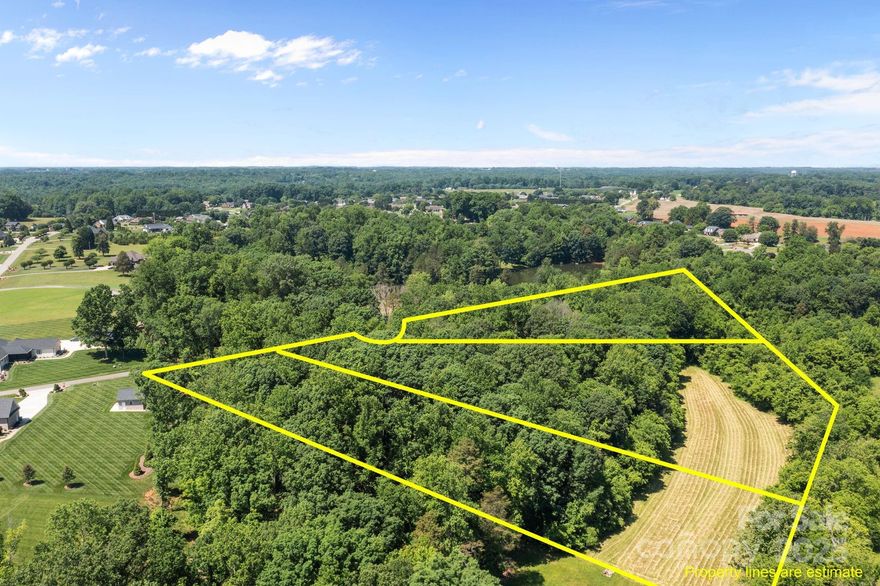 Rare opportunity to purchase 8.8 pristine acres with THREE separate approved 4-bedroom septic layouts already in hand! Build one spectacular estate or develop all three lots – the choice is yours.
This dream property offers the perfect blend of open, usable land and private, wooded seclusion:

•  Approximately 4 level, cleared acres fronting a peaceful year-round stream – ideal for pasture, horses, vineyard, organic gardening, or a picturesque meadow homesite
•  Remaining 4± acres gently sloping and wooded – perfect for a private, elevated estate setting with winter views
Enjoy true country serenity in an established neighborhood of large, stately homes on generous acreage with plenty of breathing room between neighbors. No HOA or HOA dues!
Protective covenants ensure lasting quality and value:

•  Minimum 2,000 sq ft heated living space
•  Exterior must be at least 90% brick, stone, rock, or stucco

Conveniently located yet feels worlds away:

•  Only 3 miles to Chick-fil-A, Lowe’s, Home Depot, grocery, and daily conveniences
•  Roughly 1 hour to Asheville, Charlotte, or Greensboro
•  1.5 hours to the Blue Ridge Mountains
•  3.5 hours to the Carolina coast

Perc tests complete, septic improvement permits issued and active for all three 4-bedroom layouts, survey recorded, and ready for immediate building permits. Bring your builder and break ground this season!
Don’t miss this turn-key development or private estate opportunity – properties like this are nearly impossible to find!