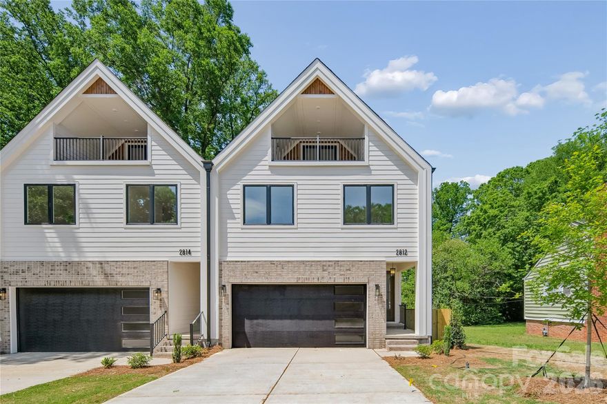 Discover modern luxury living in the heart of Charlotte's most dynamic up-and-coming neighborhood - Revolution Park! This stunning townhome offers sophisticated living with a spacious two-car garage, premium finishes, and an open, light-filled design. Gas range, tile backsplash and stainless steel appliances included. Engineered hardwoods throughout, custom lighting fixtures and accent/trim walls bring this well-designed home to life. Designer tile in the bathrooms plus a walk out balcony on the third floor with seasonal views of Uptown Charlotte. Nestled in a rapidly growing neighborhood just minutes from South End, Wilmore, and Uptown Charlotte, this home puts you at the center of it all. Enjoy effortless access to top restaurants, breweries, cultural hotspots, major employers, and endless entertainment—without the long commute. No HOA means freedom to live life on your terms—no restrictions, no fees, just pure ownership enjoyment. Schedule your tour today!