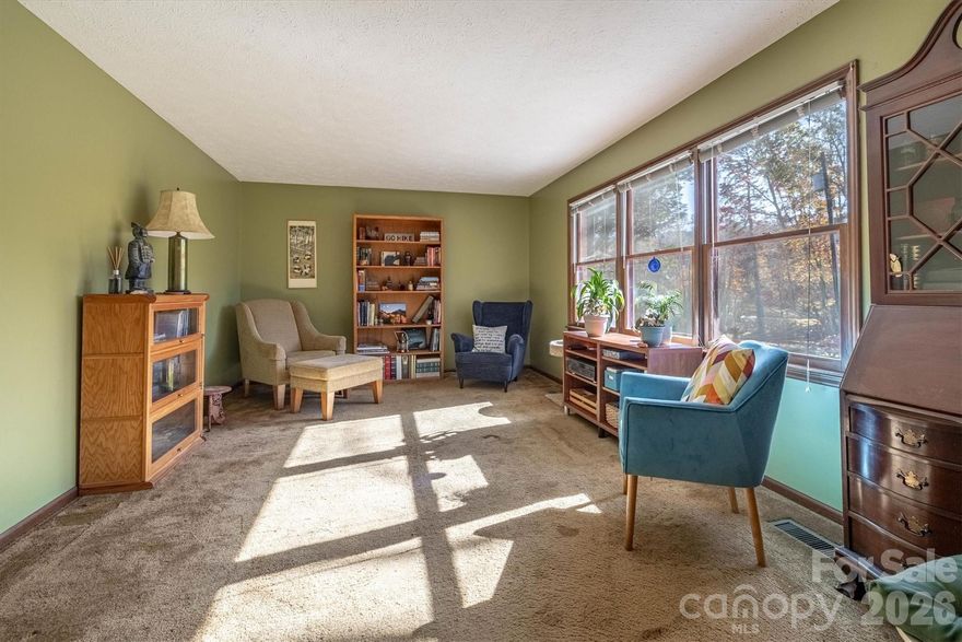 Explore the opportunity of this 3-bedroom, 2-bath home in the desirable Ramblewoods subdivision. The main level welcomes you with a spacious foyer that opens to a bright living room filled with natural light. The kitchen and dining area lead directly to a generous patio, perfect for outdoor gatherings. Upstairs, you’ll find a primary bedroom with an en-suite bath, two additional bedrooms, and a freshly updated full hall bath. The lower level offers a cozy den with gas logs — ideal for relaxing or entertaining. A partial basement provides laundry and extra storage. This home is ready for its next chapter!