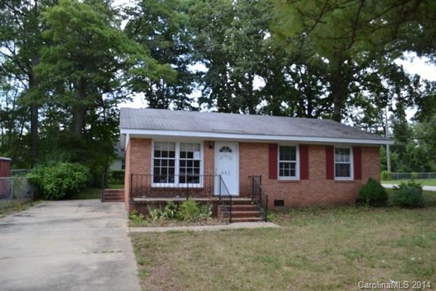 Brick ranch home needs TLC and has lots of potential.  3 bedrooms, 1.5 baths, spacious kitchen and living area.  There is no range or HVAC system.  Bank owned.  Age of home is approximate.  Purchase addendum that is attached must be completed and submitted with an offer.  As is sale!