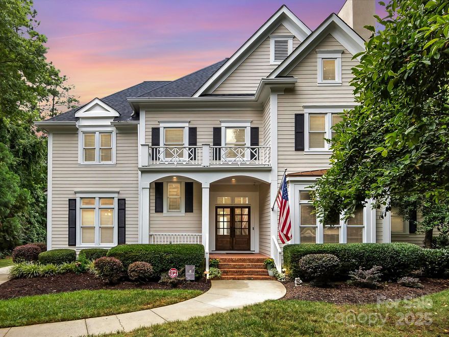 This home is not just a home. It's a lifestyle.  Welcome to your oasis in the heart of the highly sought after, amenity rich Overlook community.  Breathtaking main channel views, deeded boat slip, renovated from top to bottom, community beach out your backdoor, and 20 minutes to Uptown and the airport. What more could you ask for?   Drenched in natural light, gorgeous water views from much of the home, room to roam and a spacious primary on the main, will make you never want to leave.  Step outside to discover an abundance of outdoor space, ideal for entertaining or simply savoring those main channel views.  This home includes a 4-car garage AND a charming guest apartment boasting a living room, full bath, a bar and bedroom that provides comfort and privacy for guests. Don't miss this rare opportunity to own a slice of paradise with all the modern comforts at your fingertips.