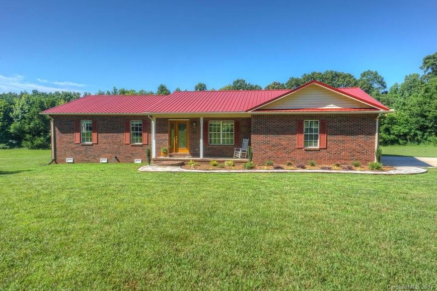 Looking for privacy away from all the hustle and bustle?  Over an acre of land and NO HOA??  Then look no further, this all brick ranch home truly offers all that and more! Step inside and enjoy the Pottery Barn feel with freshly painted warm earth tones and new pergo laminate flooring throughout, an all brick wood burning fireplace, an open kitchen and living room concept as well as recessed lighting and a large new deck over looking a private backyard.  Put this one on your short list today!