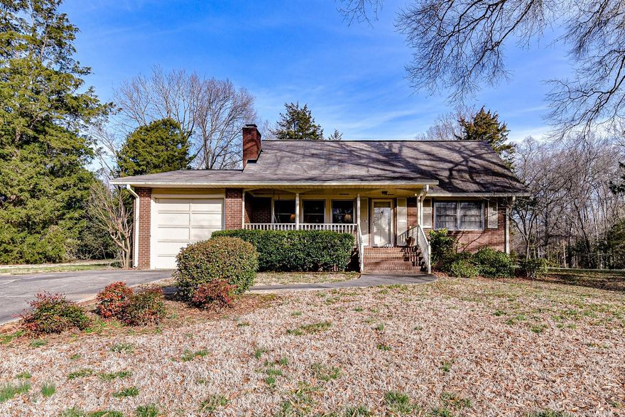 Tremendous property in the Davidson Village Infill w/varied possibilities. 3 BR/2 Bath, 1.5 story brick home built in 1965. Property is in good condition but hasn't been significantly upgraded in 15-20 years. At this price point, a probable buyer will likely subdivide the parcel. Similar to several recent sales w/in 2 blocks of this property. Please see the CMA land sale analysis in attachments. Home features covered front porch, screened-in porch & deck to oversee large private backyard. Fourth bedroom is currently used as an office (There is a closet behind shelves). Quiet street that ends in a cul-de-sac. No through traffic. For the buyer who doesn't plan to develop, the VIP Yellow Overlay District would allow for expansion to roughly 3,425 heated sq feet(calculations in attachments). It would also allow a detached garage & garage apartment for more sq. footage. Another option would be to add an Accessory Dwelling which could be used for a family member (see guidelines). Sold AS IS.