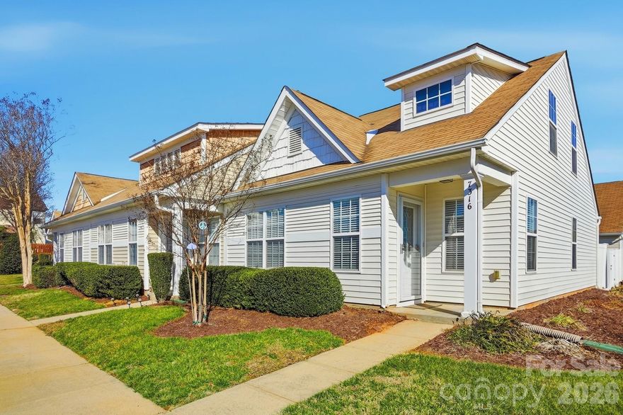 This one is special. Unique and charming end unit with windows that flood the living spaces with light. Move-in-ready, interior is painted in neutral designer tones, featuring a kitchen with classic stainless steel appliances, black/white granite and white oversized subway tile backsplash. Entry has a board and contrasting paint feature wall, and the living room also features a neutral contrasting wall. Awesome Murphy bed with bookcase surround conveys in one of the secondary bedrooms. Large primary bedroom also has bookcases surrounding the bed space and high ceilings.  Note the oh-so-cute farmhouse style primary bathroom. Primary closet features adjustable shelving for customizing. Enjoy relaxing in your own courtyard with tall privacy fencing. Really such a special home in the neighborhood.