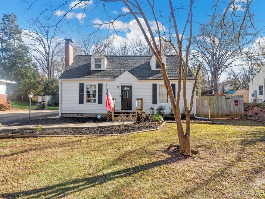 This home is centrally located, around the corner from the Concord Historic District, within walking distance to downtown Concord, minutes from Atrium Cabarrus, the Speedway and Hwy 585. This house sits on just shy of a quarter acre that includes a fenced in rear yard, an outdoor fireplace and the Garage. Upon entering you will walk into the large Great Room with the original Hardwood floor, decorative Fireplace setting and the bright sunlight. The kitchen and dining area are also good sized. Located on the main level is  the Primary Suite, the second bedroom and bathroom. Upstairs is the third bedroom. Additional features include new gutters and leaders, total new plumbing and NO HOA. Call today to set up a tour.