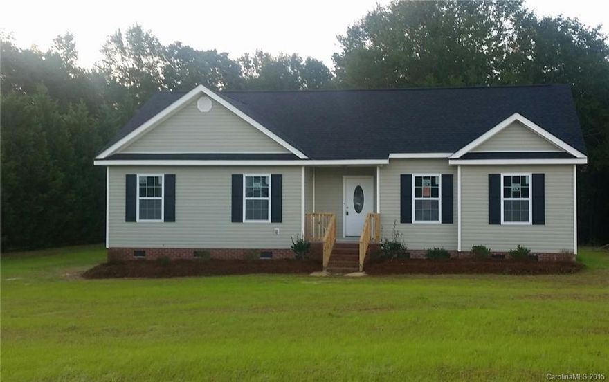 This new construction ranch home is located in an established neighborhood, on a large .83 acre lot.  It features living room with vaulted ceiling, kitchen with ceramic tile floors and honey glazed cabinets.  The split floor plan affords privacy to a spacious master bedroom with tray ceiling, walk in closet, master bathroom with soaking tub and custom designed ceramic tile shower.  The two other bedrooms share a full hall bath. Enjoy the large rear deck and partially wooded back yard.