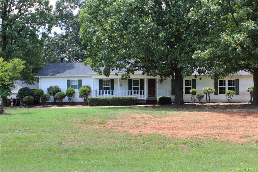 Great home in the country with mature trees on beautiful lot! 3 bedroom house has large rear deck, detached garage and shed, fenced in area. New paint throughout, new double French rear doors, cedar walk in closets, open kitchen/great room area with brick fireplace, updated landscaping, convenient to Monroe or Pageland. Won't last long