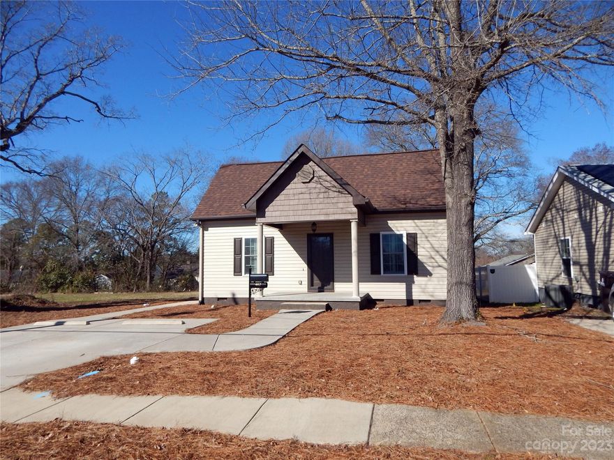 This updated ranch offers spacious rooms, creating a comfortable and inviting atmosphere. The well-designed kitchen comes complete with a pantry, and the high ceilings throughout add a sense of openness. The inclusion of plantation shutters not only enhances privacy but also adds a touch of classic elegance. Enjoy your morning coffee on the charming front porch or entertain guests on the trex deck at the back. Additional features include a convenient storage building and peace of mind with a new roof and HVAC system installed in 2023. Located close to downtown Rock Hill, this property combines modern amenities with a convenient location.  This home qualifies for the Community Lending Program which provides up to $4,500 credit to buyer from the lender at closing.  Ask for more details.