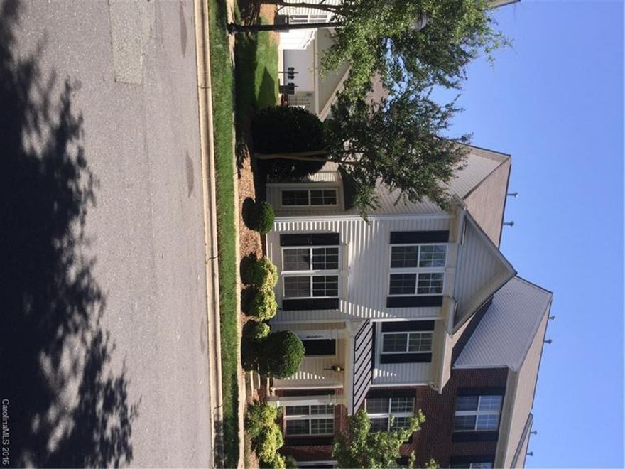 High demand end-unit 2 bedroom townhome with new carpet and paint! Upon entry, enjoy upgraded vinyl, a large kitchen showcasing black appliances, eat-in dining area at a breathtaking bay window. For ease, the laundry is downstairs (w&d included).  Upstairs offers two spacious bedrooms with private bathrooms. The master suite has extra large walk-in closet and oversize windows.  The master bath has a dual vanity and garden tub. Two car driveway behind the home. Locked storage unit at driveway.