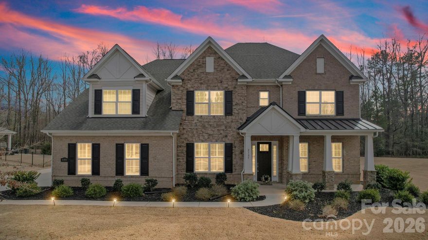 Experience elevated luxury at 2185 Loire Valley Dr, an elegant estate home in the exclusive gated community of Bretagne, just minutes from Ballantyne. Built in 2020 and completely turnkey, this stunning residence offers five en-suite bedrooms and modern luxe finishes throughout. Inside, an open layout reveals a private study and a great room flowing into a gourmet kitchen with quartz counters, double ovens, and a butler’s pantry. Main level includes a guest suite (second primary); upstairs, a large bonus room expands the living area, and the primary suite offers a spa-like bath and a private balcony overlooking wooded grounds.
Set on a flat 0.70-acre lot, the home provides ample privacy, perfect for a future pool or garden oasis. Enjoy resort-style community amenities including pool, cabana, and clubhouse plus top-rated schools, shopping and dining nearby. A rare opportunity to own an elegant, move-in ready home that blends luxury, privacy, and convenience in one of Charlotte’s most sought-after enclaves.