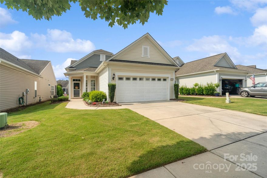 This well maintained two bedroom, two bathroom patio home offers the perfect blend of comfort, style, and low maintenance living. Step inside to find an open floor plan with a flex space ideal for a home office or sitting area. The primary suite offers a walk-in closet, walk in shower, double vanities and plenty of space. The gourmet kitchen features granite countertops, stainless steel appliances, ample cabinetry, and a cozy breakfast nook overlooking the landscaped yard. Enjoy peaceful nights on the screened in porch that has been upgraded with travertine tiles. With two large community centers and plenty of amenity choices including golf, pickleball and tennis courts, fitness center, scenic walking trails, & more- Sun City Carolina Lakes residents stay entertained, enlightened, and physically active. Come see why so many love this community and area today!