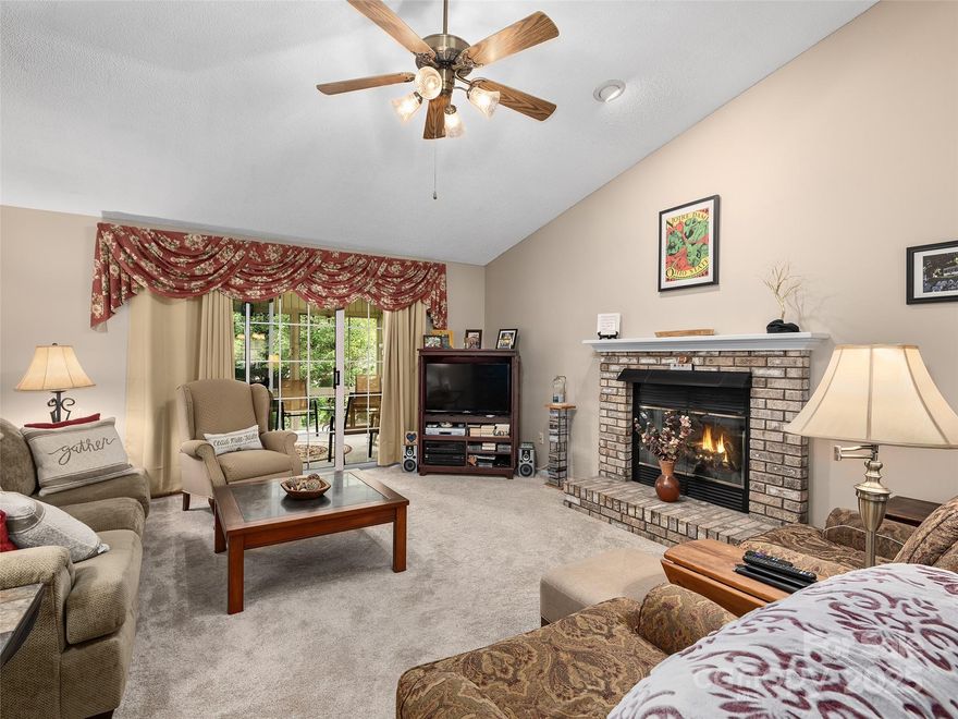 Welcome to 3 Wentworth Court, a well-maintained home located in a peaceful neighborhood in the heart of Etowah. If you work out of your home, this property offers the perfect workspace! This inviting home features 3 spacious bedrooms, 2 full baths, and a desirable split bedroom floor plan offering privacy and comfort. The cozy living room includes a gas fireplace and opens into a bright sunroom with beautiful southern exposure—perfect for year-round enjoyment. The kitchen offers plenty of cabinet space, a built-in desk area, and both a breakfast bar and breakfast nook. A formal dining room adds elegance for gatherings. The generous primary suite includes a walk-in closet and an en-suite bath with double vanities, a soaking tub, and separate shower. Two additional bedrooms provide space for guests or a home office. A functional mudroom/laundry area adds convenience. Downstairs, you'll find a walk-out basement with windows and some heated space, offering flexible options for recreation, entertainment, or another home office (not included in the total square footage), plus ample storage. The pool is right around the corner, along with tennis and pickleball courts for active recreation. The home is equipped with a 22kW Generac generator and connected to city water, city sewer, and natural gas, ensuring convenience and reliability. Enjoy a beautifully landscaped front yard and the quiet charm of this established neighborhood.