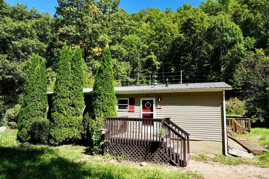 2 Bedroom / 2 Bath on the River!
Enjoy riverfront living at the base of Cole Mountain on nearly half an acre. Relax to the sounds of the water, cast a line, or explore one of the many nearby hiking trails. Inside, you’ll find a spacious primary suite with a double-sink vanity and walk-in closet, a great room with a wood-burning fireplace, monitor heater, and heat pump, plus a convenient laundry area and modern kitchen. Great as-is opportunity. Whether you’re a buyer seeking a vacation getaway or an investment, this property offers comfort, charm, and easy access to nature.