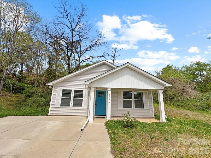 Welcome home! This brand-new ranch home is on .67 acres in a great Hickory location near downtown. LVP flooring throughout all main living areas and bathrooms. Effortlessly entertain guests with the open floorplan from the great room, dining area, and kitchen. The kitchen features a large sink, granite countertops, white shaker cabinets, Appliances, and seating at the island. There is a laundry room right off the kitchen as well! Split bedroom plan with the primary suite tucked in the back of the home for maximum privacy. The primary suite features a ceiling fan, dual vanity with granite countertop, a large walk-in closet, and a tiled shower. On the opposite side of the house, there are two guest rooms, each with a closet and a shared full bathroom with a single vanity with granite countertops and tub/shower combo. Enjoy the covered front porch and private backyard, with NO HOA. Come see this custom-built home today!