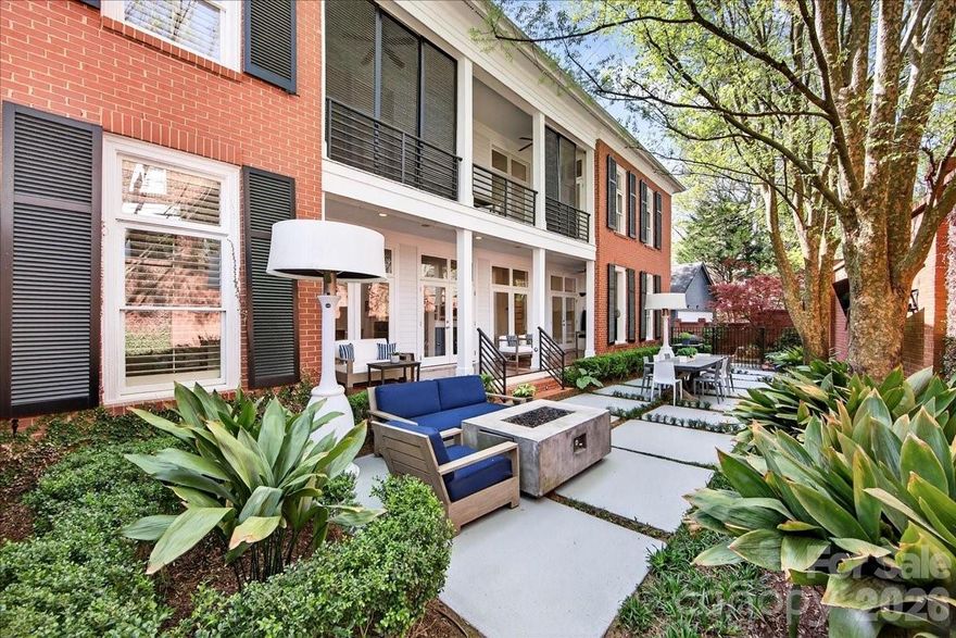 Welcome to Charles Town! An enchanting hidden gem that captures the timeless elegance of Charleston, SC, just moments from the premier lifestyle of SouthPark.

This custom-built brick residence, thoughtfully designed by its original owner in 2001, offers 3 bedrooms and 2.5 bathrooms, blending sophistication and everyday comfort seamlessly. At the heart of the home, a stunning private courtyard serves as a true outdoor sanctuary. It is perfect for peaceful mornings immersed in nature or hosting unforgettable gatherings with effortless grace.

Inside, a recently completed $200K kitchen renovation showcases exceptional design and craftsmanship. Outfitted with top-of-the-line appliances—including a Wolf oven and range, Cove dishwasher, and a statement True refrigerator and wine refrigerator. This space is both striking and highly functional with island seating. Sleek, modern cabinetry, a multi-function workstation sink, and a built-in coffee system elevate the kitchen into a true culinary experience.

Soaring 10-foot ceilings on both levels, rich hardwood flooring throughout the main living areas, a warm gas fireplace, and timeless plantation shutters further enhance the home’s refined character.

A detached two-car garage with a dedicated fitness studio offers added versatility, while the HOA ensures a lock-and-leave lifestyle with included lawn maintenance and shared driveway upkeep.