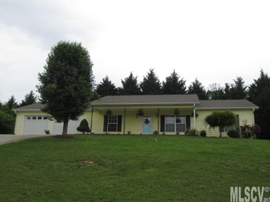 Location, location, location! Affordable one level living in Hudson! Spacious ranch with Oversized Double car garage! Split floor plan with BIG bedrooms! Open living and dining area with galley kitchen loaded with cabinets, lots of counter-space and Stainless Steel Appliances.  MBR is large and features a walk in closet. Garage leads to mud room with laundry area. Nice paved patio area in back with new fire pit and covered front porch.