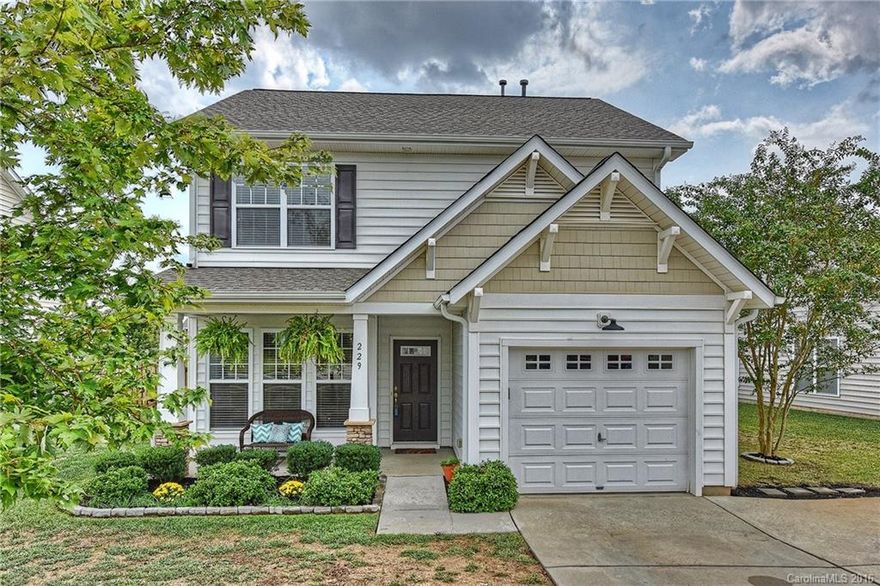 Charming home in sought after Whitley Mills. Kitchen features SS appliances, tile back splash, Corian counters & upgraded cabinetry w/breakfast bar. This wonderful home has all new updated flooring throughout the first floor. Master has vaulted ceilings & walk-in closest.  Enjoy the large flat fenced yard. Walking distance to club & pool. Easy access to award winning school, Baxter, and Charlotte.