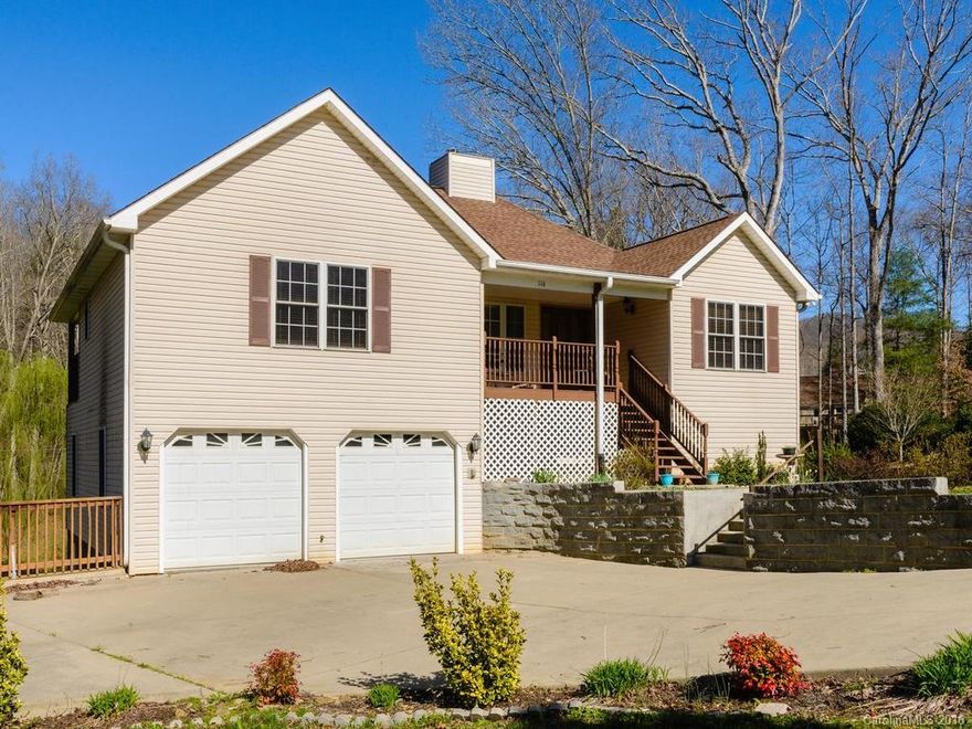 Spacious two story traditional with 3 bedrooms and 2 bonus rooms downstairs. Rich, newly refinished, hardwood and tile floors, crown molding, cozy granite fireplace and tray ceiling living-room, Back deck, side balcony and front covered porch for outdoor entertaining and outdoor living. Two car garage and large basement for storage. All nestled next to stream at end of cul-de-sac.