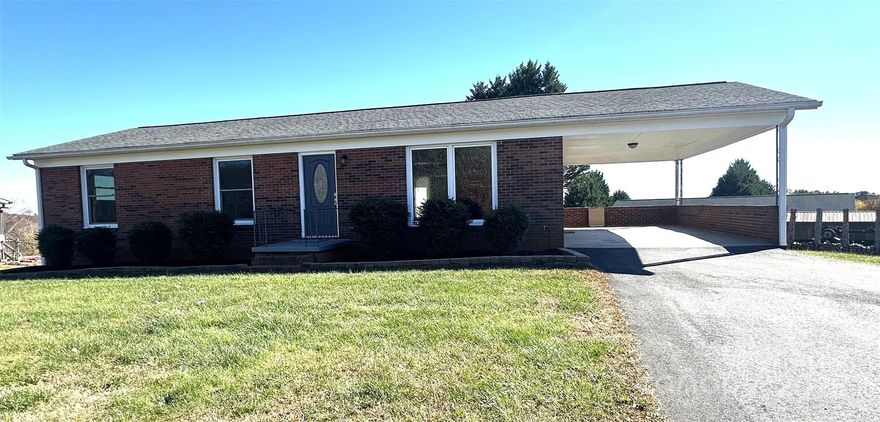 Charming brick ranch with basement, carport, and corner lot near Lake Hickory access—ideal for relaxed living or investment potential.  Welcome to 922 Rink Dam Road, a classic 3-bedroom, 2-bath brick ranch with partially finished basement, laundry room and extra heated storage, nestled on a 0.45-acre corner lot in Taylorsville, NC. Built in 1970, this home offers timeless appeal with thoughtful updates and a location that blends convenience with natural beauty.

Whether you're a first-time buyer, investor, or downsizer, this home offers solid value and lifestyle flexibility. With its proximity to Lake Hickory and local amenities, it’s a rare find in Alexander County.  Ready and priced to move—schedule your showing today! 

No septic permit on record as their records only go back to 1985.  Basement has a well pump and whole-house water filtration system installed.  The home comes with a refrigerator and microwave, but no stove or dishwasher.  Home has had very recent renovation with modern finishes.  Washer and dryer to remain.
